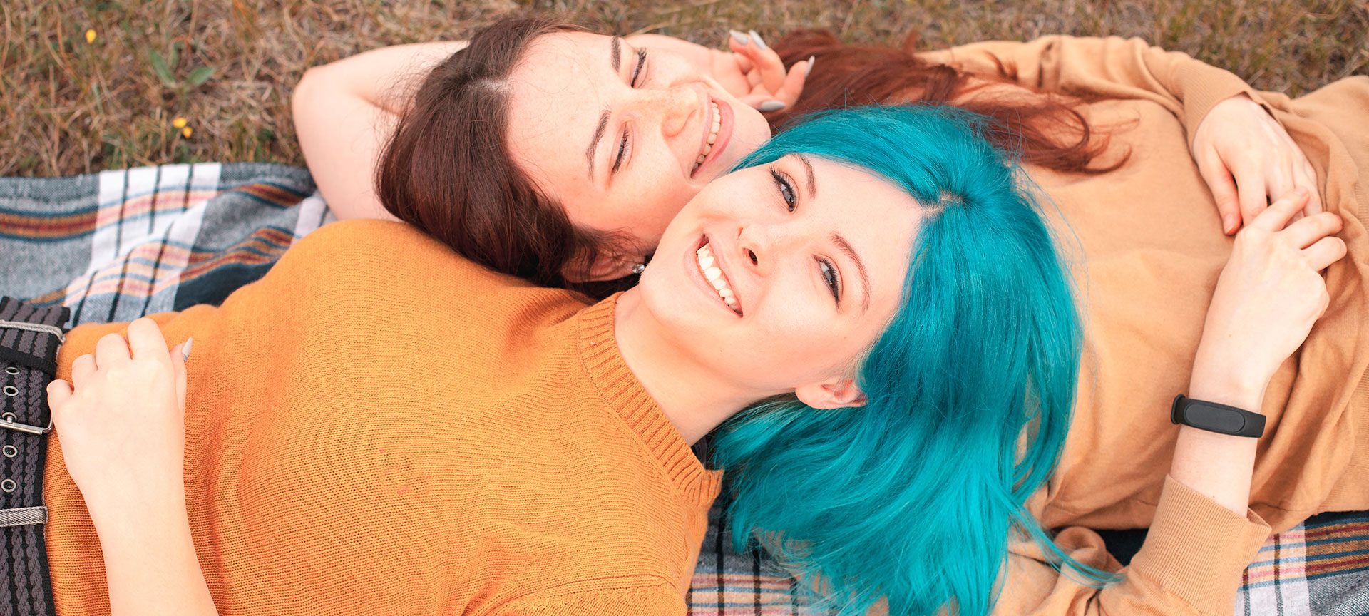 Two girls celebrating Rural Pride in a natural setting in Spain