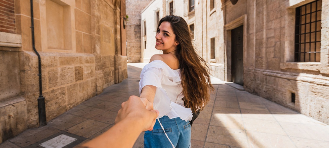 Tourist visiting a historic city in Spain Tourist visiting a historic city in Spain