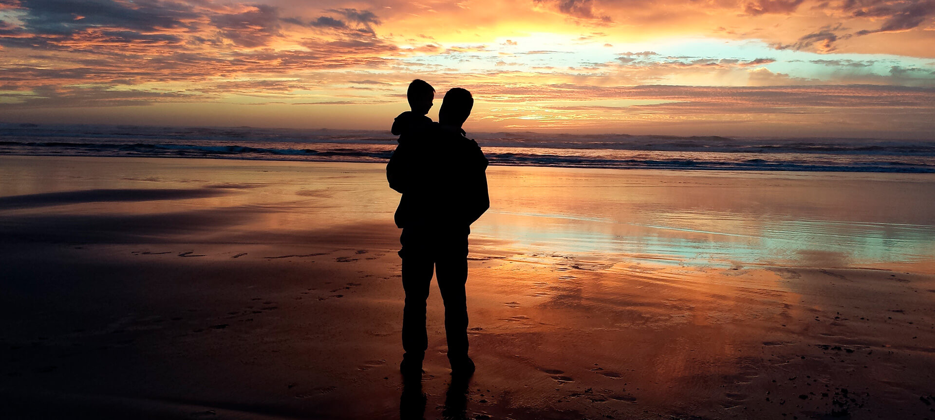 Parent and child at the beach Parent and child at the beach