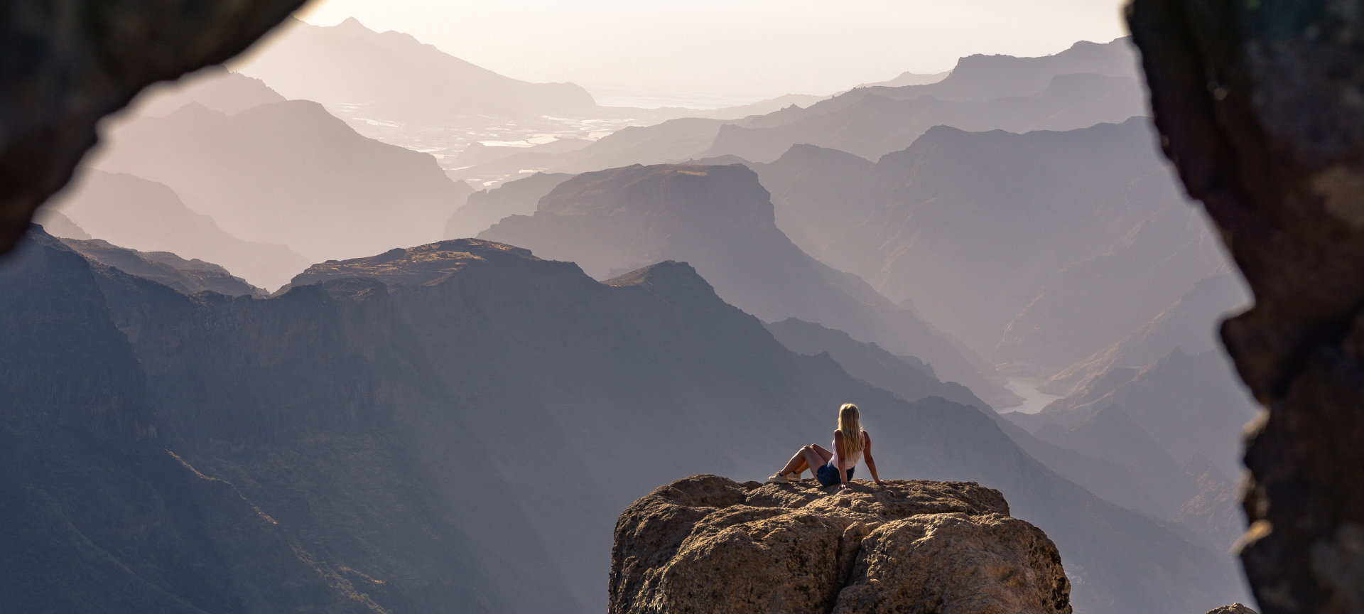 Woman admiring the scenery near Roque Nublo in Gran Canaria, Canary Islands Woman admiring the scenery near Roque Nublo in Gran Canaria, Canary Islands