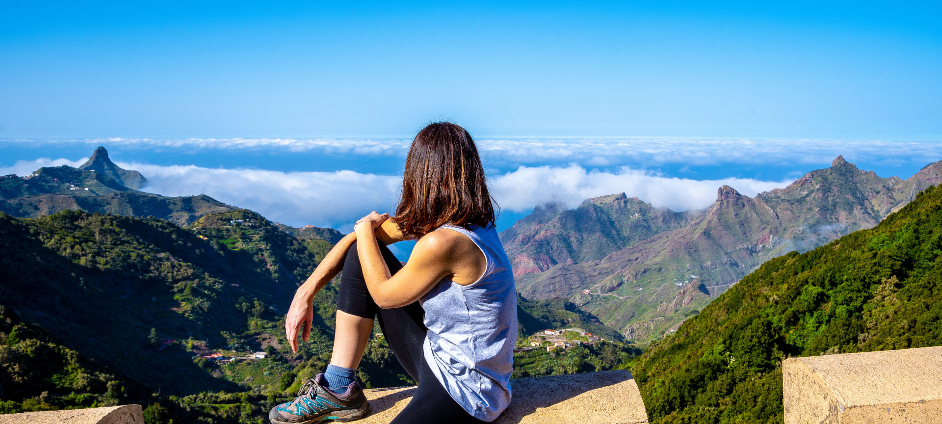 Woman looking at the mountains of Anaga, Tenerife Woman looking at the mountains of Anaga, Tenerife