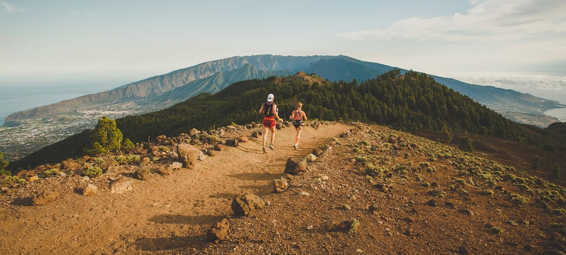 Runners along La Crestería in La Palma, Canary Islands Runners along La Crestería in La Palma, Canary Islands
