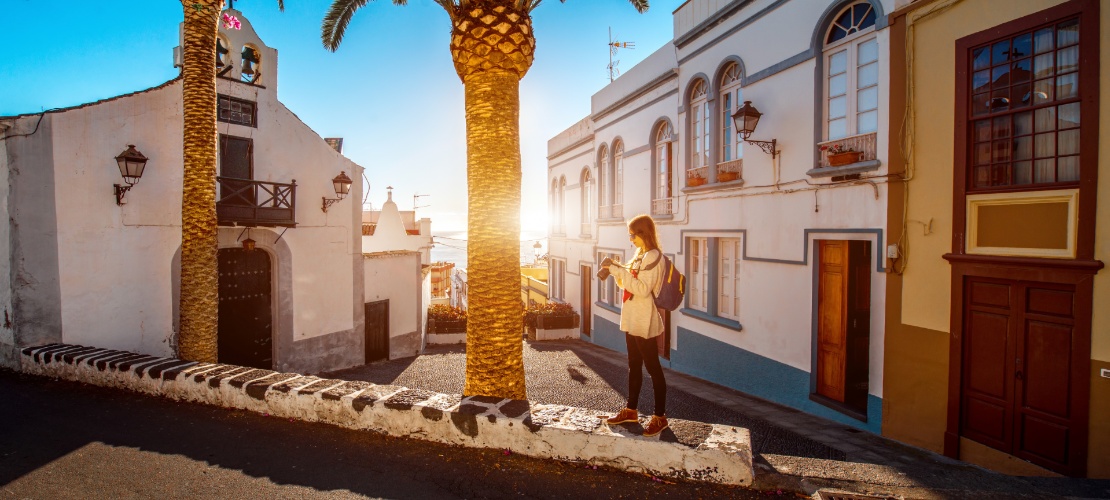 Tourist photographing the shrine of San Sebastián in Santa Cruz de la Palma, Canary Islands Tourist photographing the shrine of San Sebastián in Santa Cruz de la Palma, Canary Islands