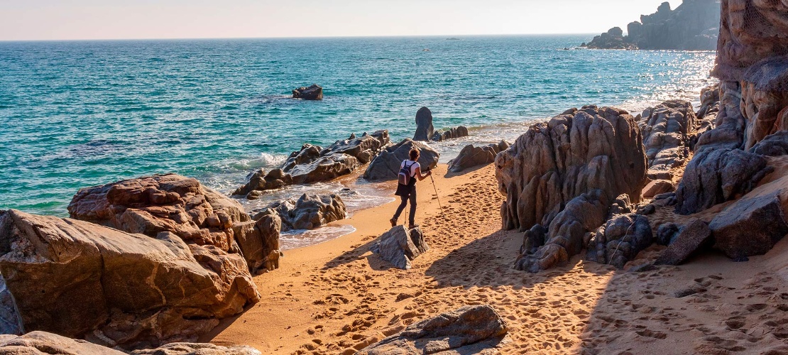 Hiker in Platja d’Aro. Costa Brava, Girona Hiker in Platja d’Aro. Costa Brava, Girona
