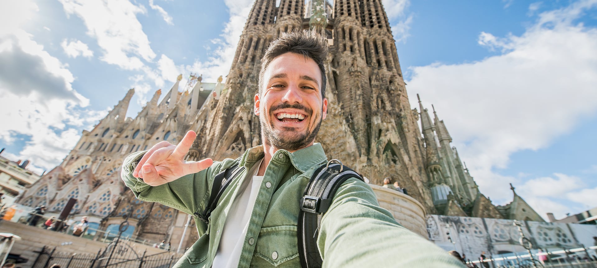 Tourist taking a selfie in La Sagrada Familia, Barcelona, Catalonia
