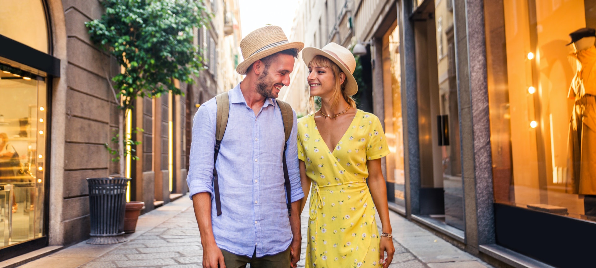 Tourists strolling in a commercial street of Barcelona, Catalonia