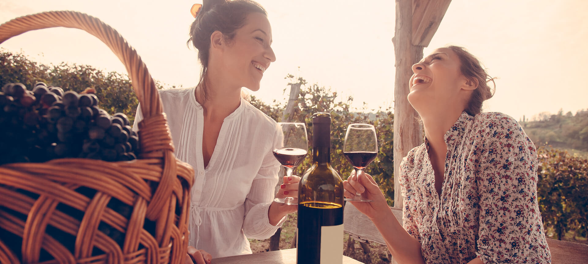 Two women drinking wine