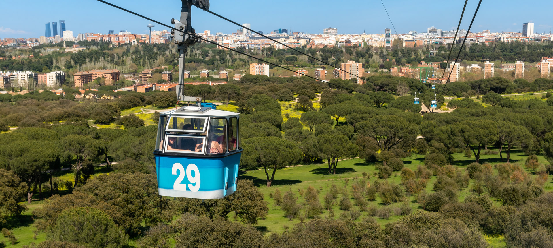 Cable car crossing the Casa de Campo in Madrid Cable car crossing the Casa de Campo in Madrid