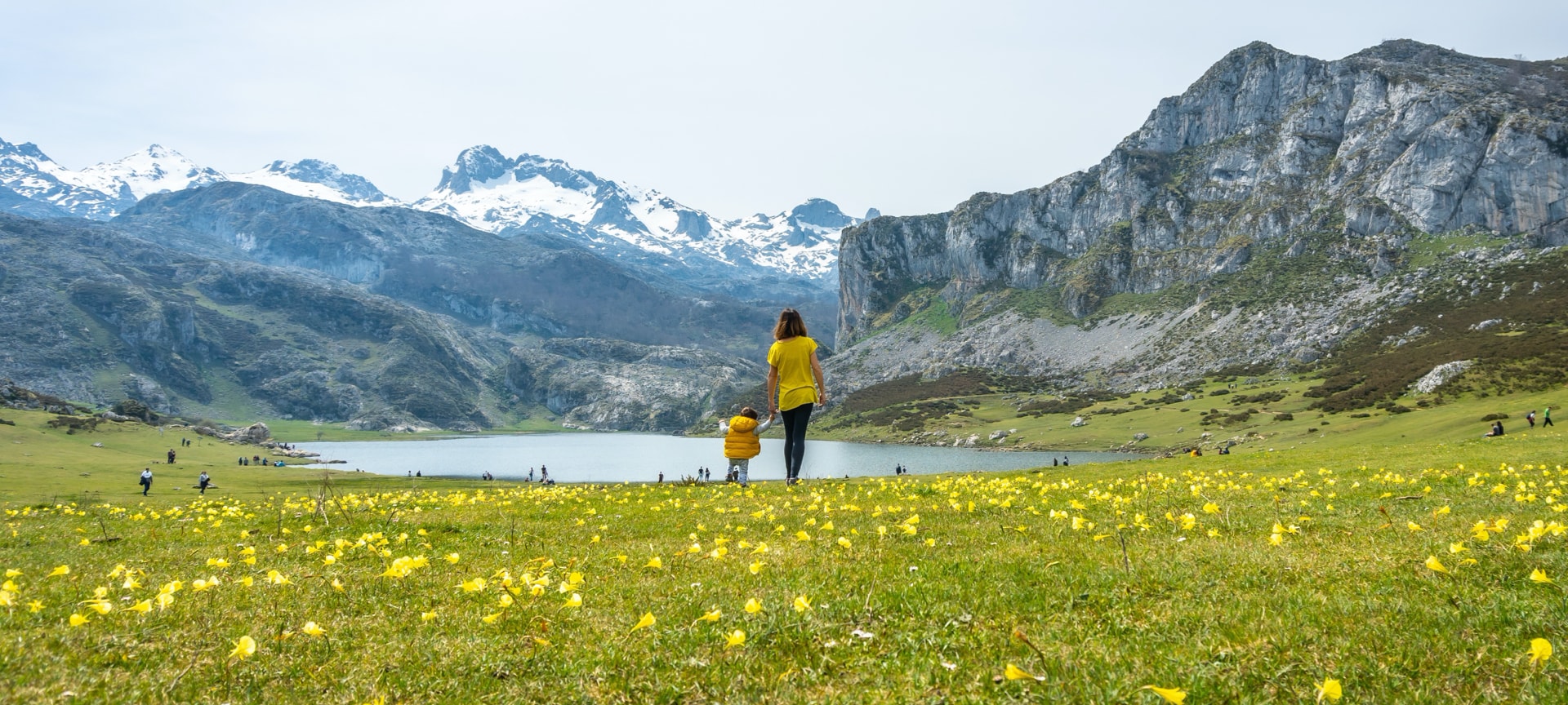 Tourists admiring Lake Ercina in the Picos de Europa National Park, Asturias Tourists admiring Lake Ercina in the Picos de Europa National Park, Asturias