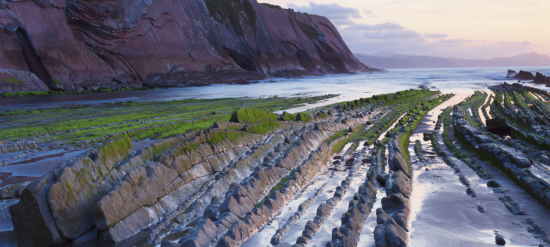 View of the Zumaia flysch (Gipuzkoa, Basque Country) on Itzurun beach View of the Zumaia flysch (Gipuzkoa, Basque Country) on Itzurun beach