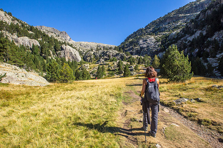 Hiker crossing Panticosa in Huesca, Aragón Hiker crossing Panticosa in Huesca, Aragón