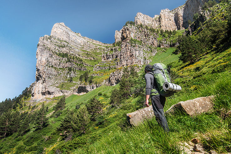 Hiker in the Ordesa y Monte Perdido National Park, Huesca, Aragón Hiker in the Ordesa y Monte Perdido National Park, Huesca, Aragón