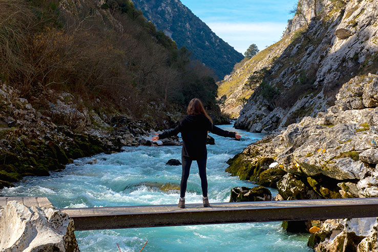 Hiker at the River Cares, Asturias Hiker at the River Cares, Asturias
