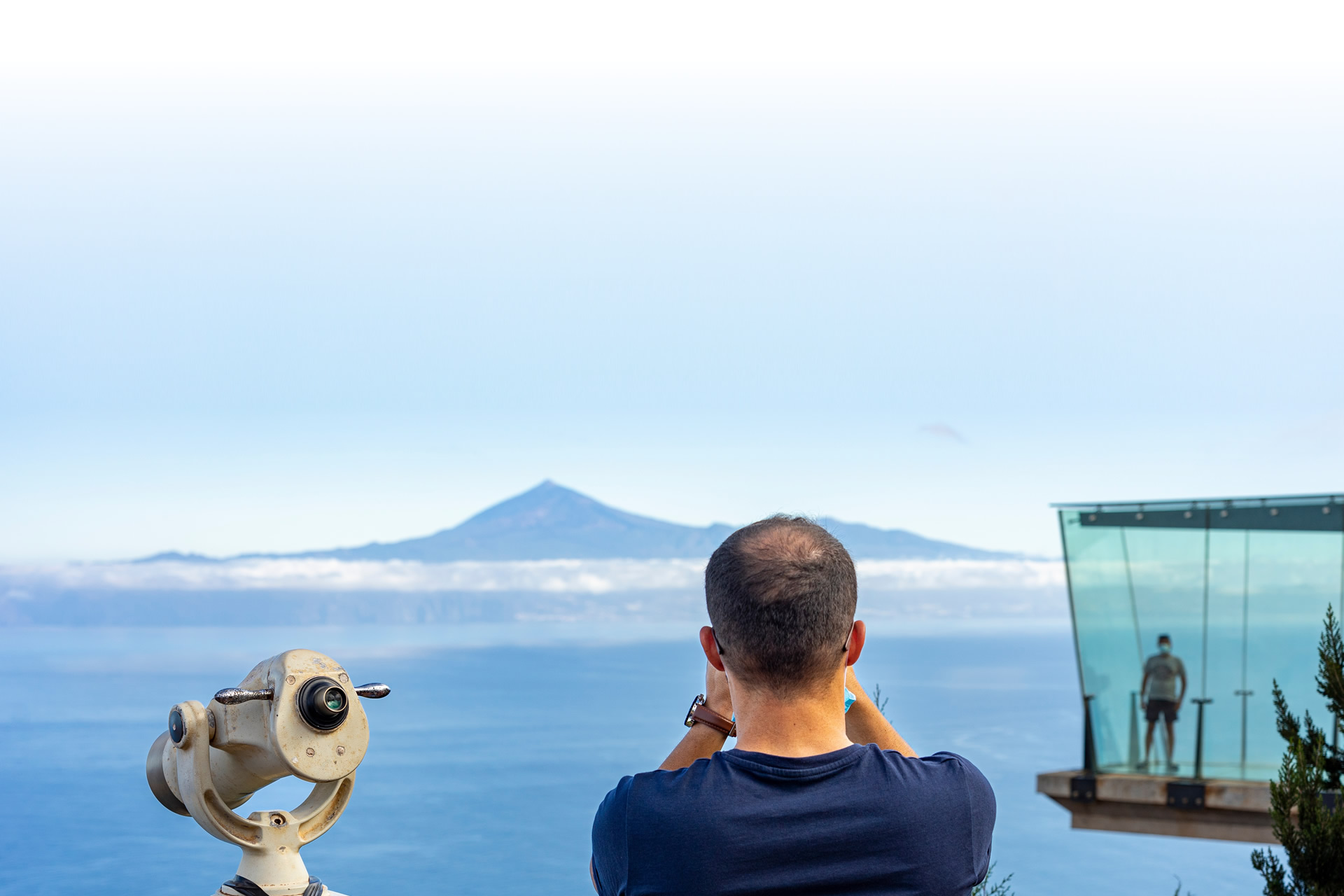 Tourist at the Abrante viewpoint in Agulo, La Gomera Tourist at the Abrante viewpoint in Agulo, La Gomera