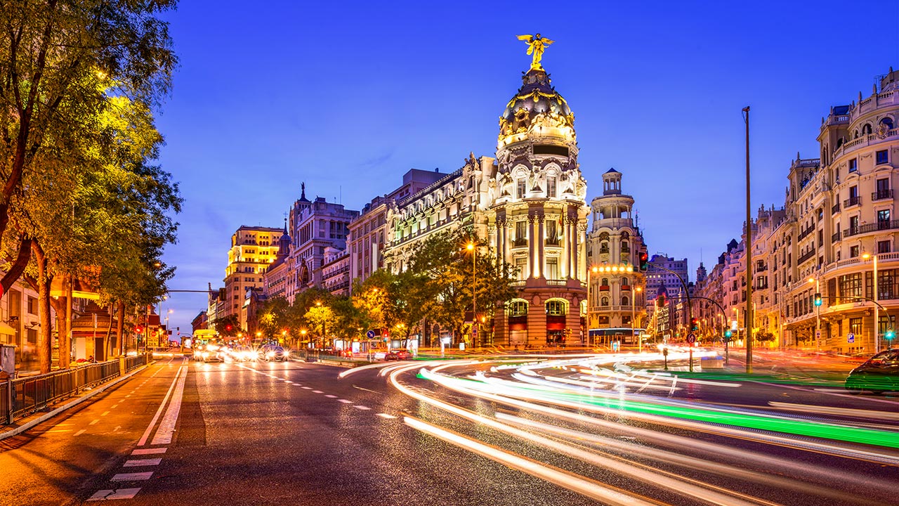 The junction of Gran Vía and Calle Alcalá in Madrid The junction of Gran Vía and Calle Alcalá in Madrid