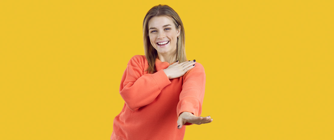 Woman dancing to the song “Macarena”