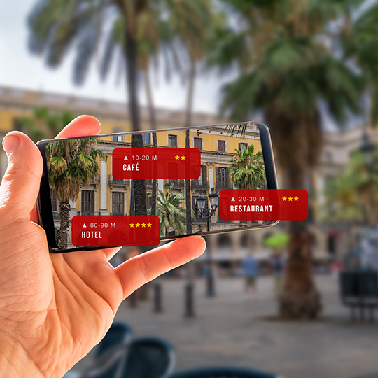 Tourist using augmented reality during his visit to Barcelona
