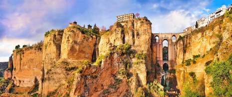 Panoramic view of the bridge and city of Ronda in Malaga, Andalusia Panoramic view of the bridge and city of Ronda in Malaga, Andalusia