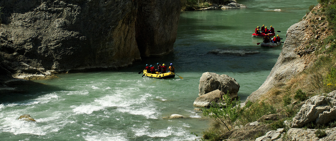 People rafting on the Gállego river in La Hoya de Huesca, Aragon People rafting on the Gállego river in La Hoya de Huesca, Aragon