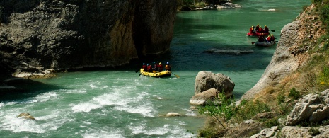 People rafting on the Gállego river in La Hoya de Huesca, Aragon People rafting on the Gállego river in La Hoya de Huesca, Aragon