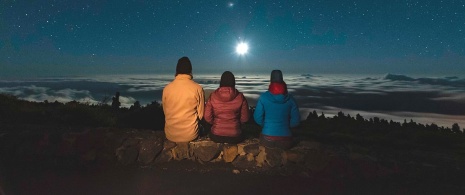Tourists looking up at the sky from the Caldera de Taburiente National Park in La Palma, Canary Islands Tourists looking up at the sky from the Caldera de Taburiente National Park in La Palma, Canary Islands