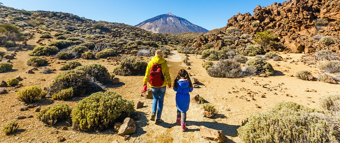 Tourists walking towards El Teide in Tenerife, Canary Islands