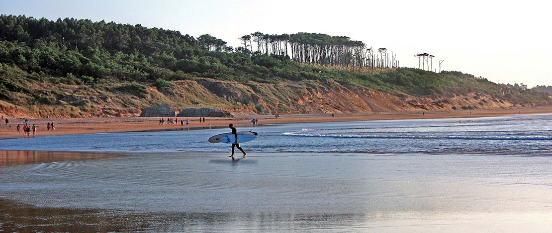 Surfer at Somo Beach, Cantabria Surfer at Somo Beach, Cantabria