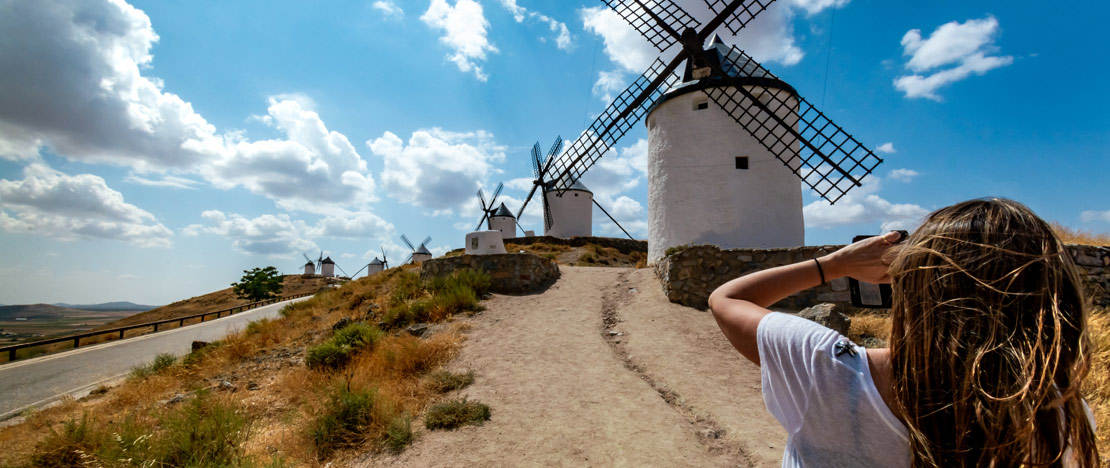 Girl at the windmills in Consuegra (Toledo, Castile-La Mancha) Girl at the windmills in Consuegra (Toledo, Castile-La Mancha)