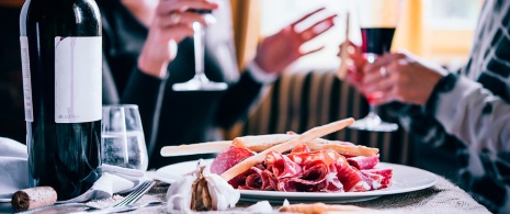 Ham tapas with red wine. Ham tapas with red wine.