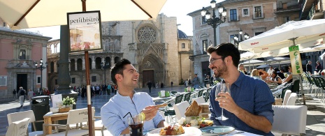 Friends on a street café in Valencia Friends on a street café in Valencia