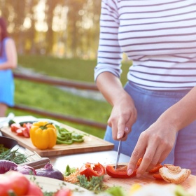 People preparing vegetables in a market garden