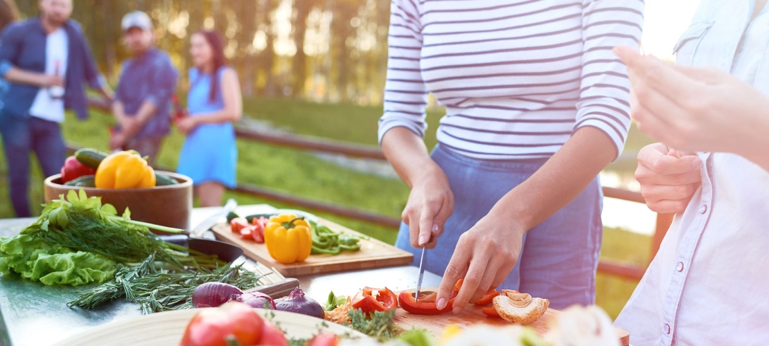 People preparing vegetables in a market garden