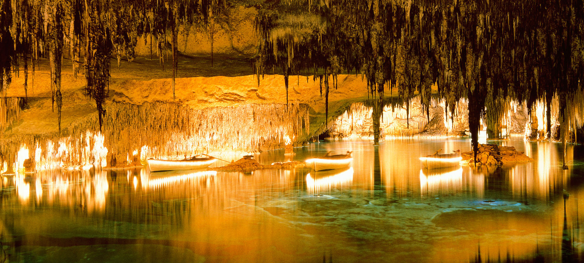Boats on the lake at the Caves of Drach